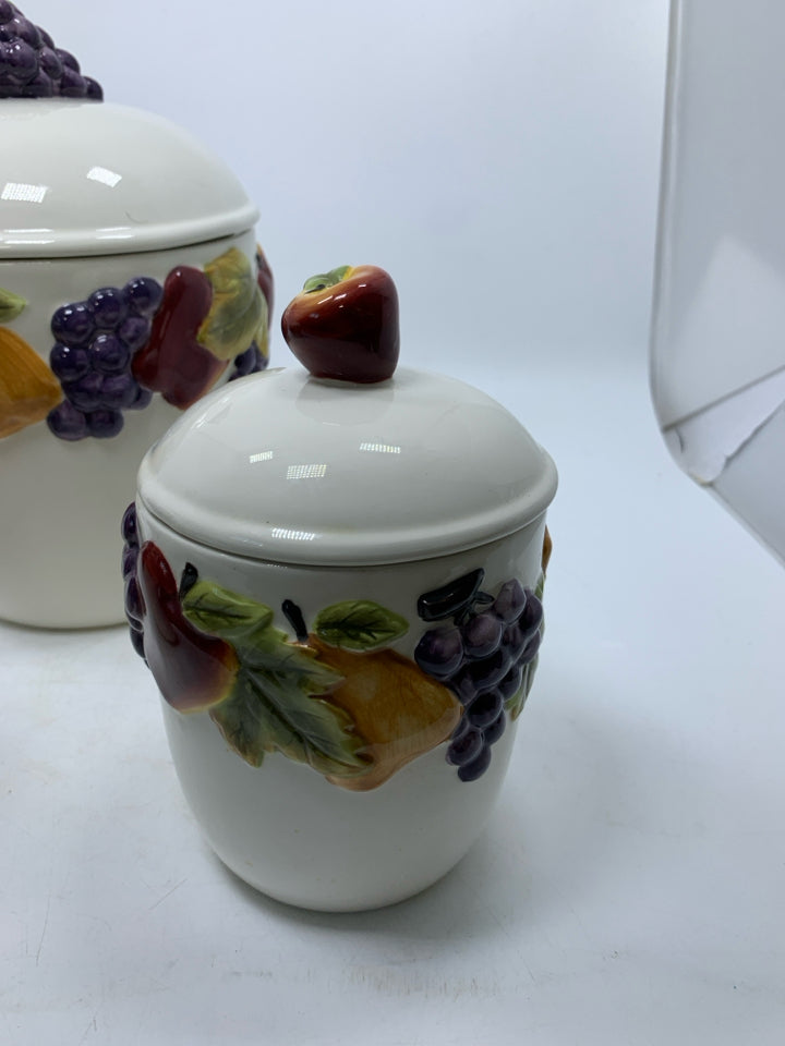 3 CERAMIC EMBOSSED FRUIT CANISTERS.
