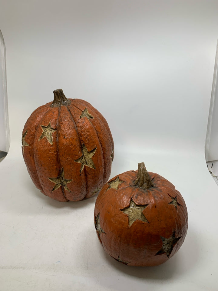 2 RESIN STAR CUTOUT PRIMITIVE STYLE PUMPKINS.