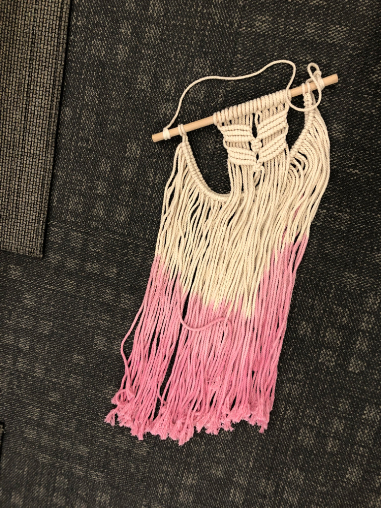 CREAM AND PINK MACRAME WALL HANGING.