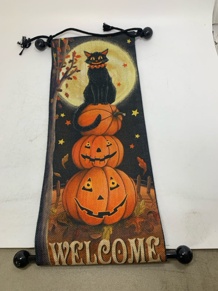 HANGING WELCOME BLACK CAT ON STACKED JACKO LANTERNS FABRIC SIGN.