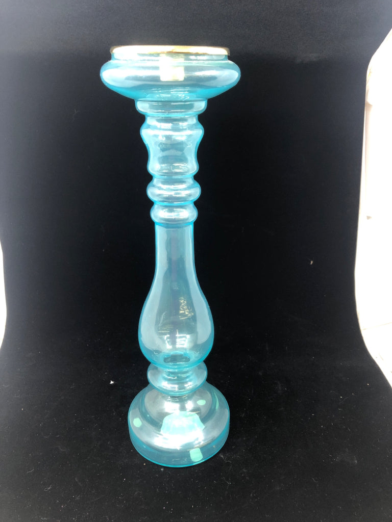 LIGHT BLUE GLASS CANDLE HOLDER.