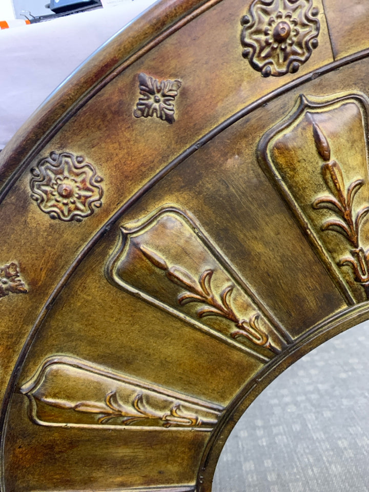 LARGE ROUND BRONZE METAL WALL MIRROR.
