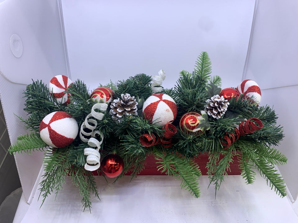 RED CRATE W CHRISTMAS ORNAMENTS ARRANGEMENT.