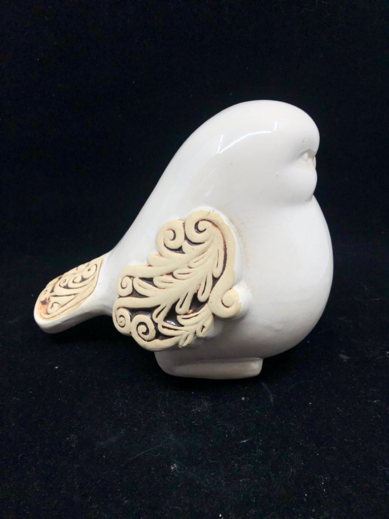 CREAM BIRD W DETAILED WINGS.