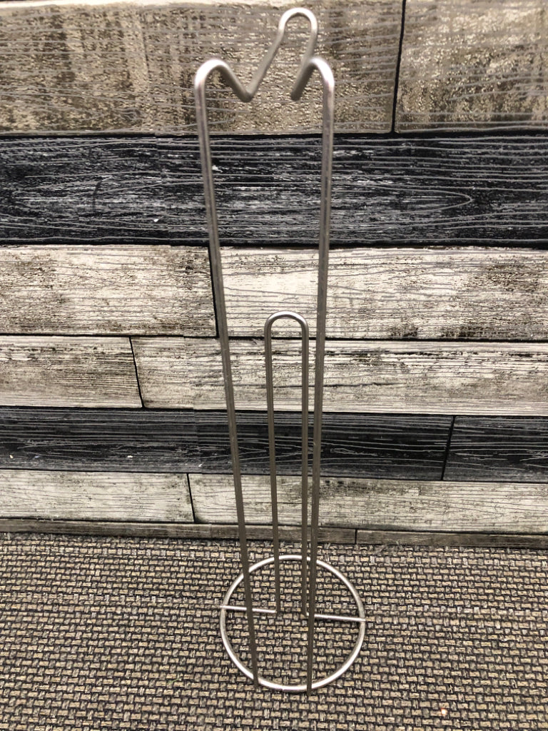 SILVER TOILET PAPER HOLDER.