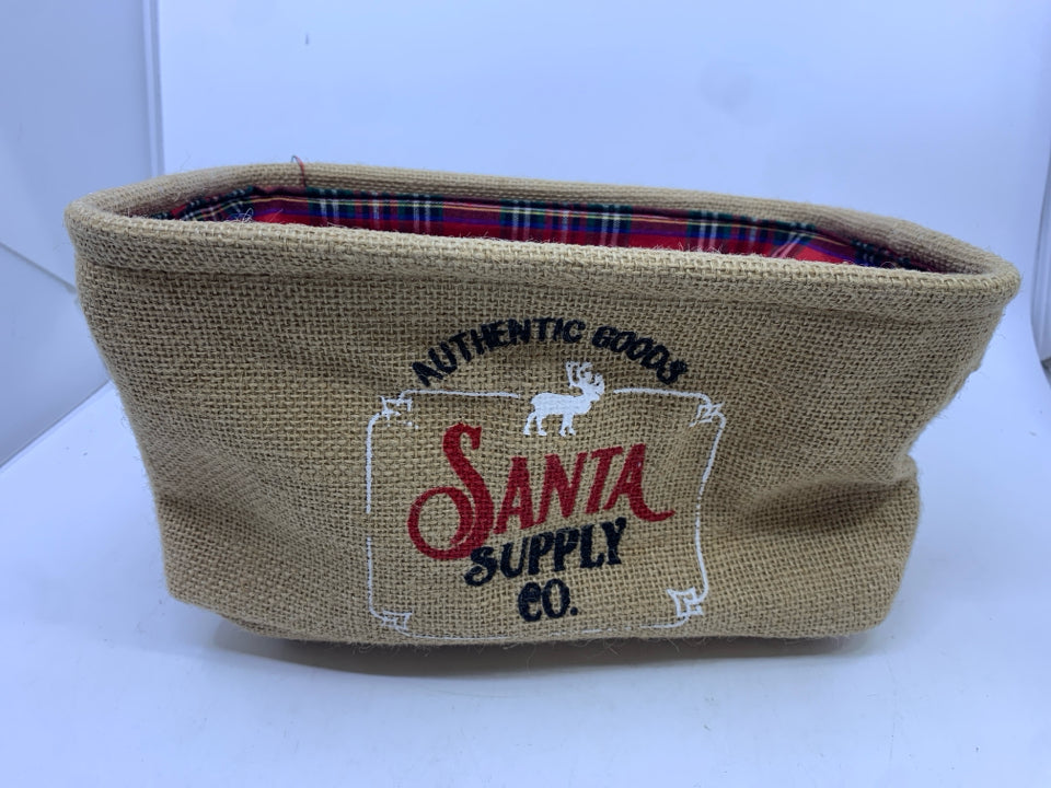 SANTA SUPPLY BURLAP BASKET W PLAID INSIDE.