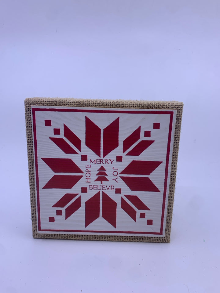 SMALL RED SNOWFLAKE WALL ART W/ HOLIDAY WORDS.
