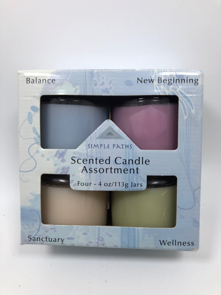 NIB 4PC CANDLE SET.