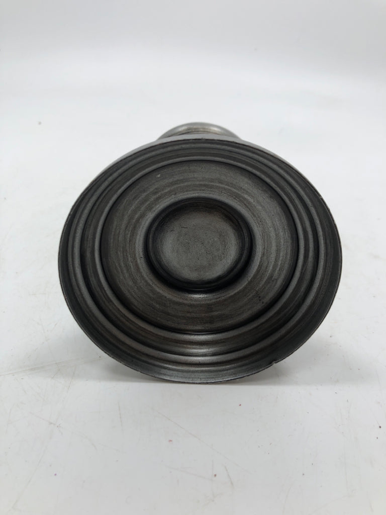 2 PEWTER COLORED TAPERED CANDLE HOLDER W/ PRIMITIVE STYLE CANDLES.