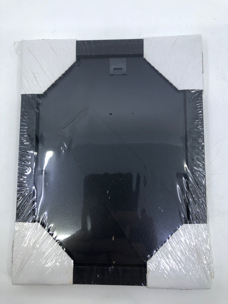 NIP BLACK PICTURE FRAME.