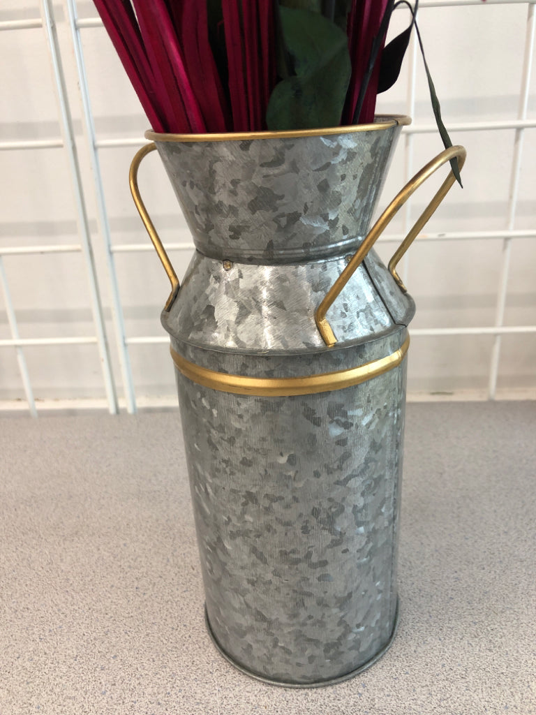 POINSETTIA /WINTER PIP IN GALVANIZED BUCKET.