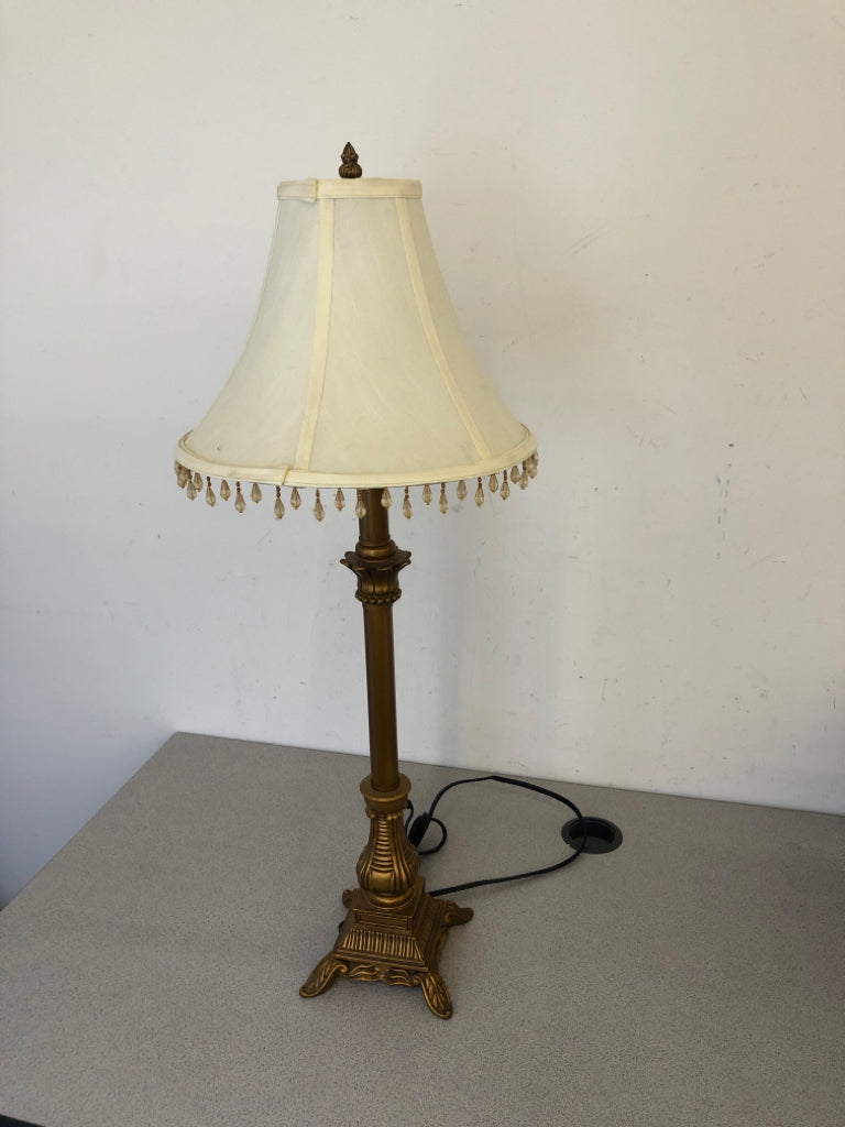 GOLD SKINNY BASE LAMP W WHITE SHADE AND JEWELS.
