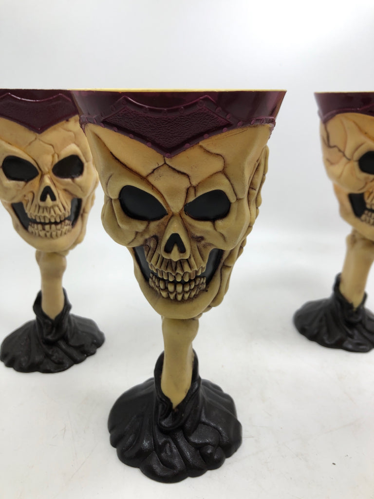 4 RED & CREAM SKULL GOBLETS.