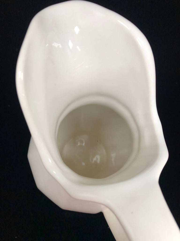 WHITE CERAMIC PITCHER.