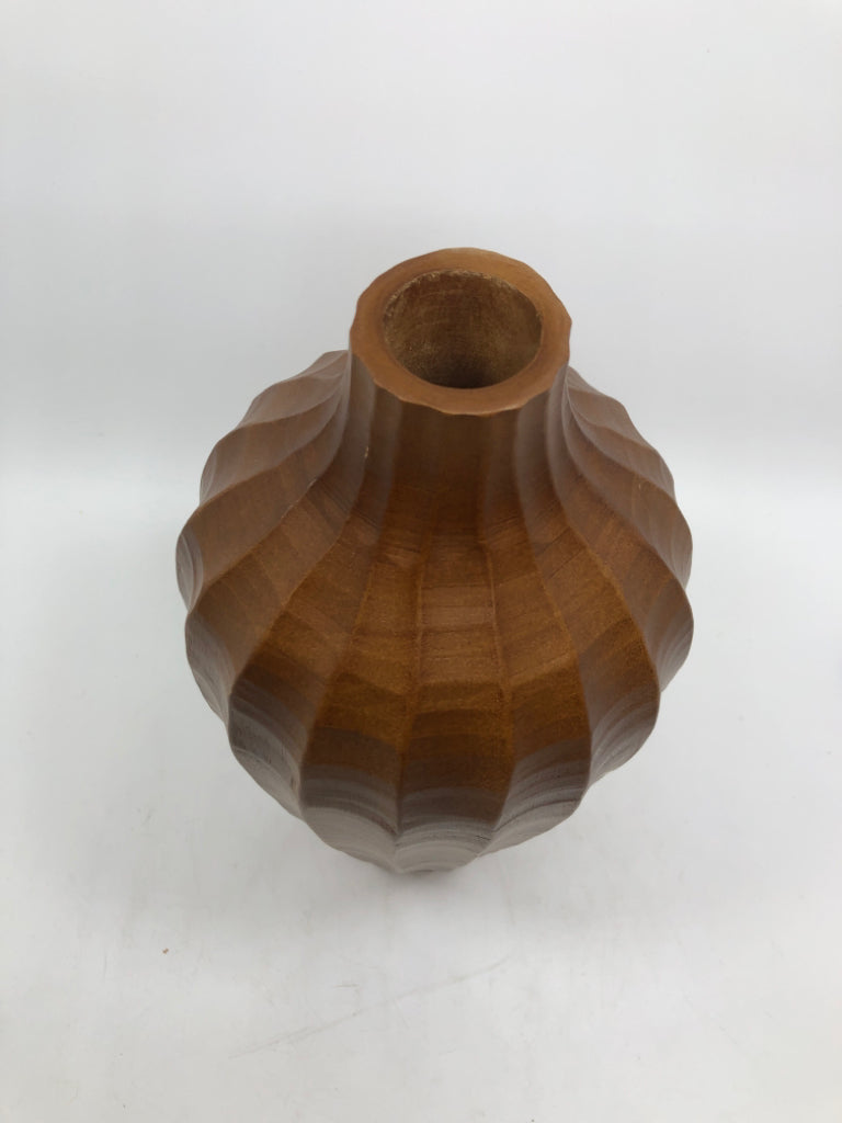 TEXTURED WOODEN VASE.