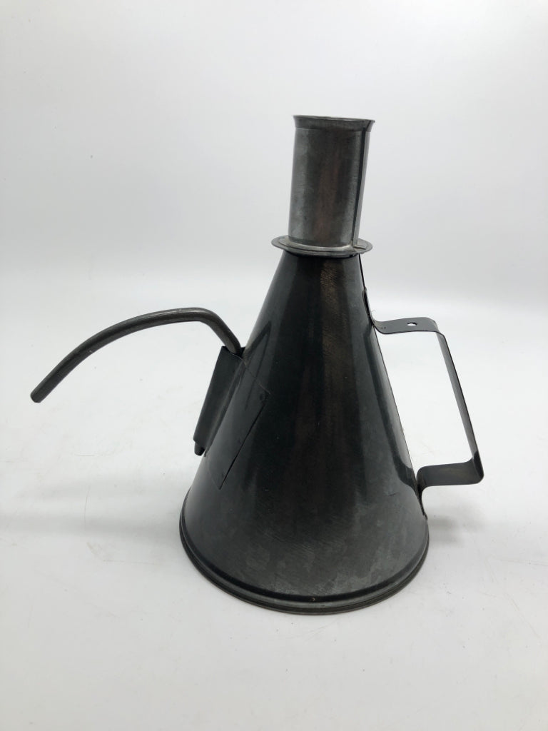 METAL OIL CAN CANDLE STICK HOLDER.