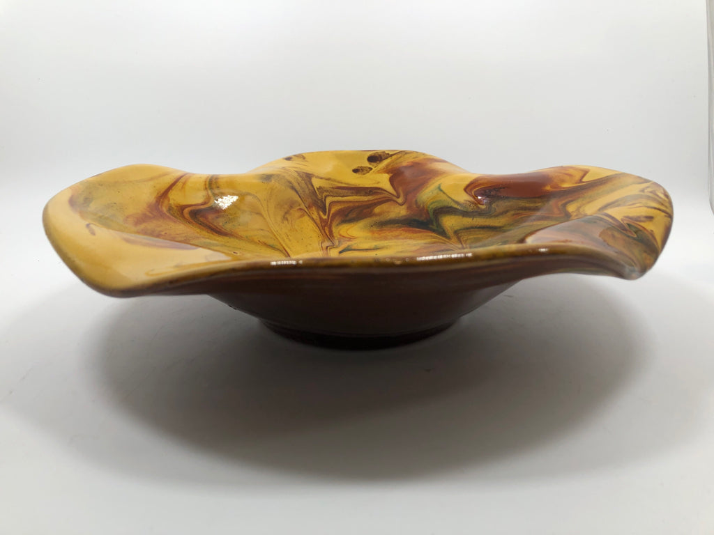 YELLOW SWIRL GLAZE POTTERY BOWL.