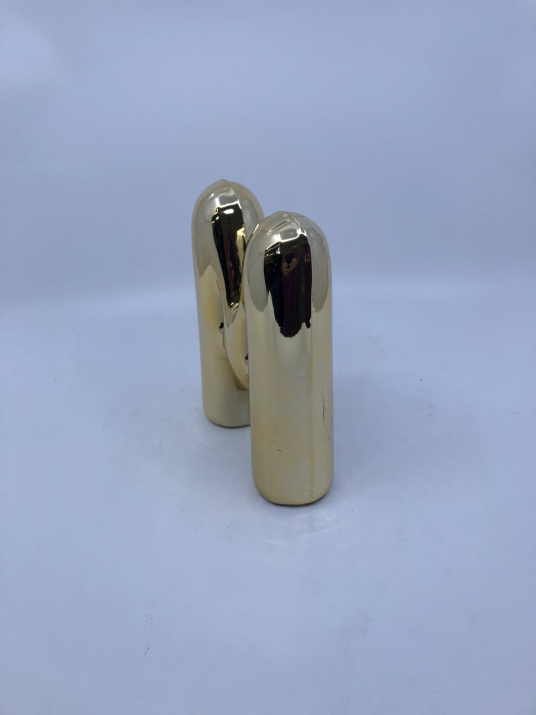 GOLD "M".