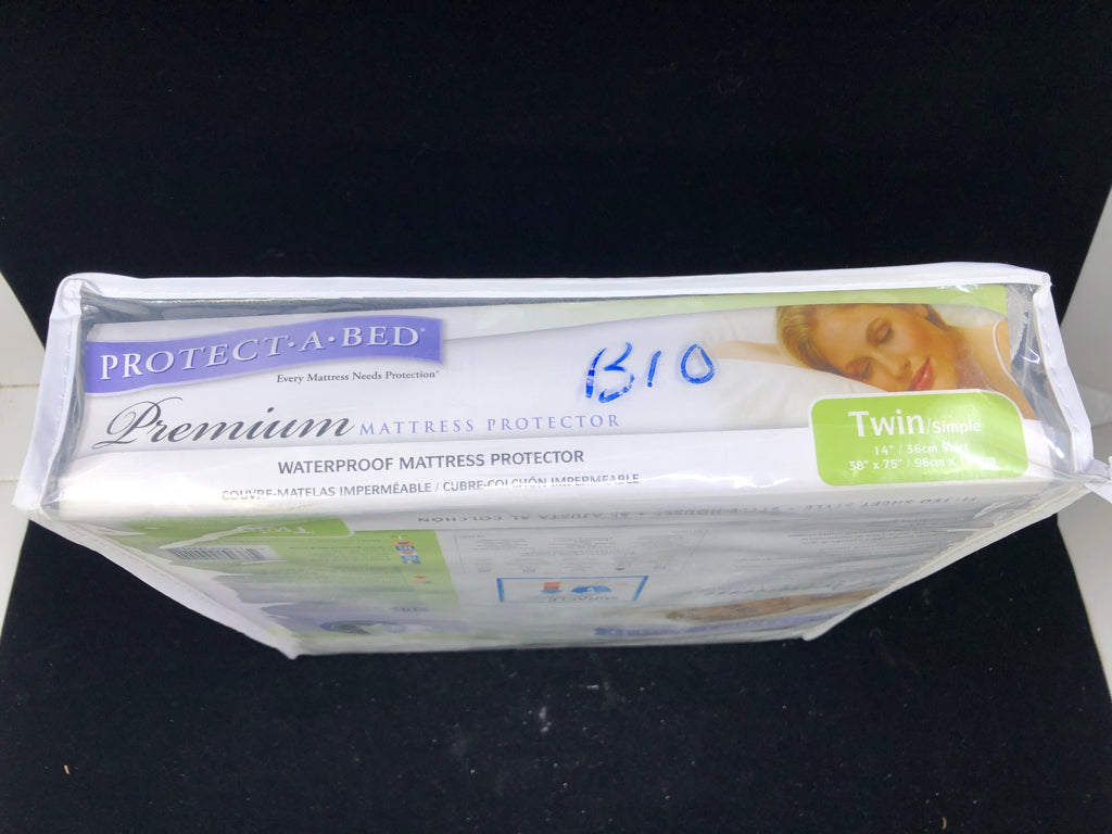 NIP PROTECT A BED TWIN MATTRESS PROTECTOR.