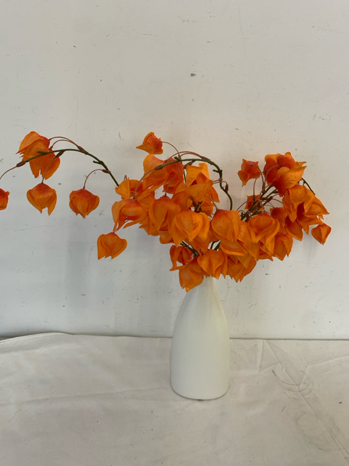 WHITE SKINNY NECK VASE W/ORANGE FLOWERS.