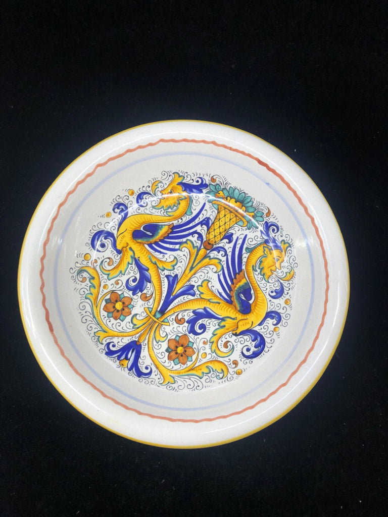 FOOTED BLUE AND YELLOW PATTERN BOWL.