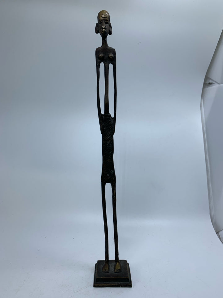 TALL METAL FOLK ART MAN W/ HANDS IN POCKETS.