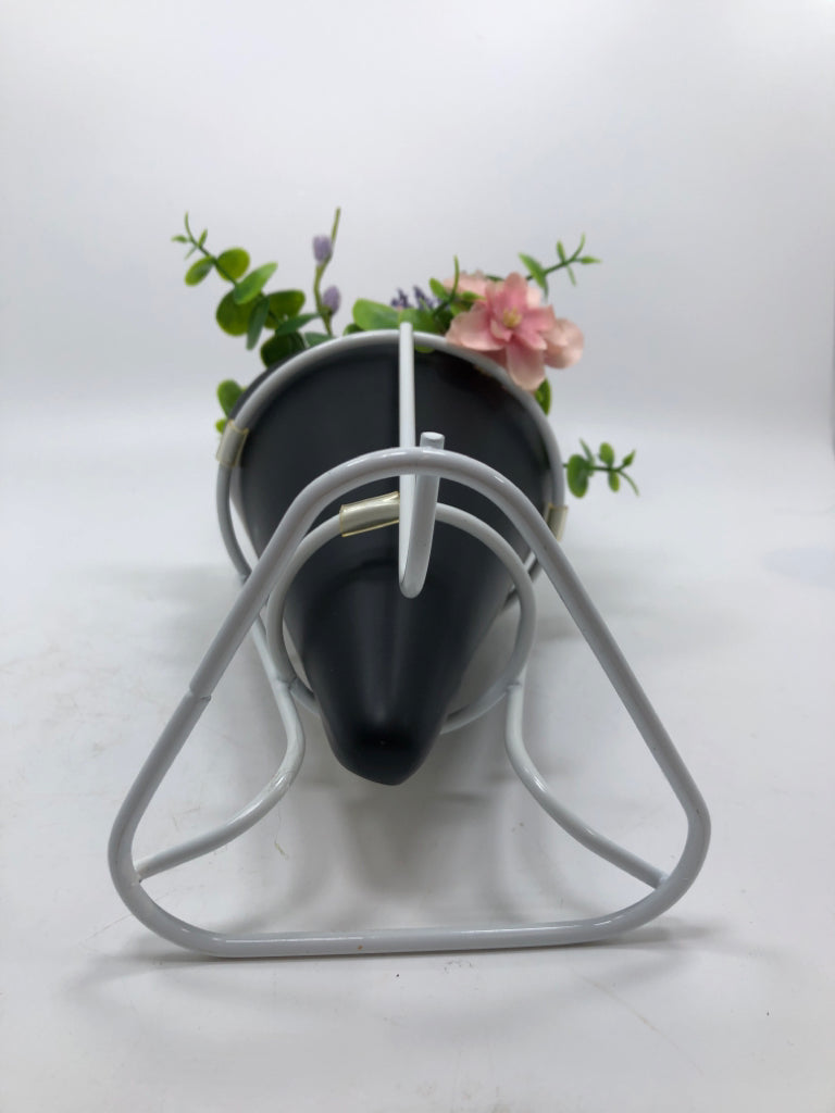 FAUX FLORALS IN STANDING PLANTER.