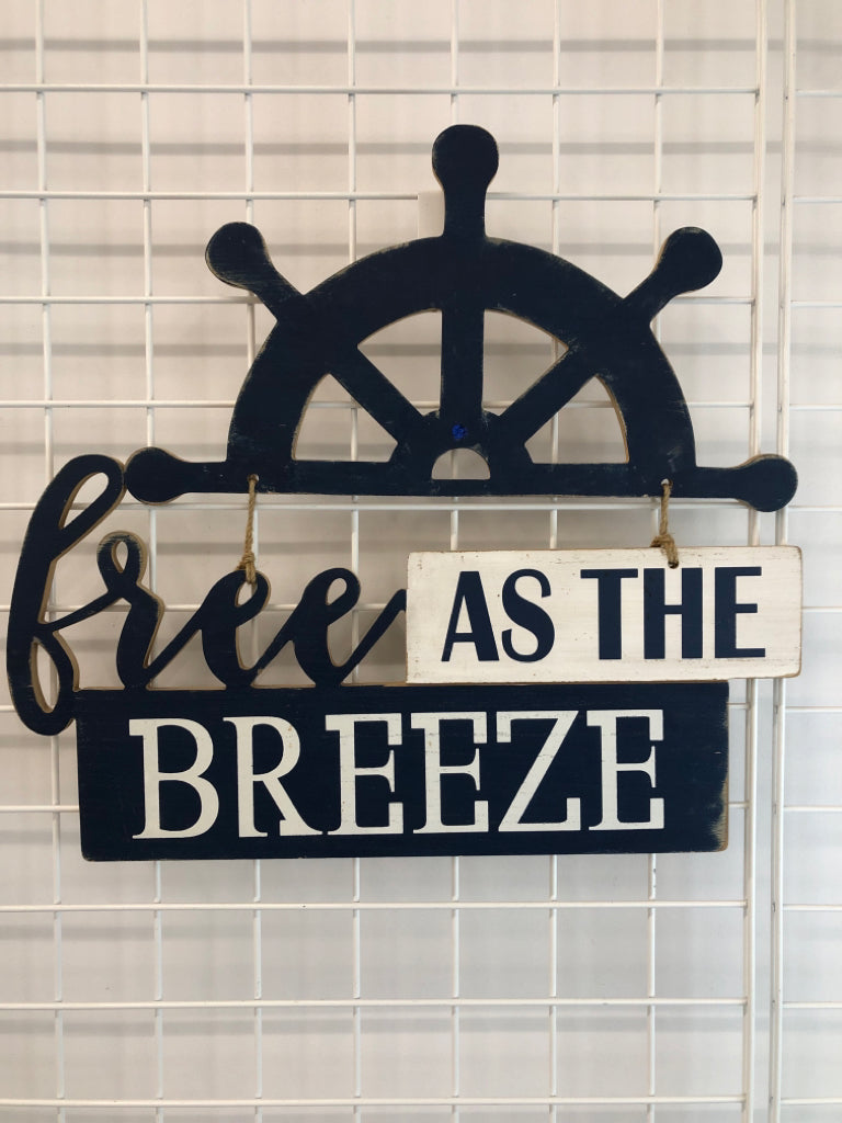 FREE AS THE BREEZE SHIPS WHEEL WOOD WALL HANGING.