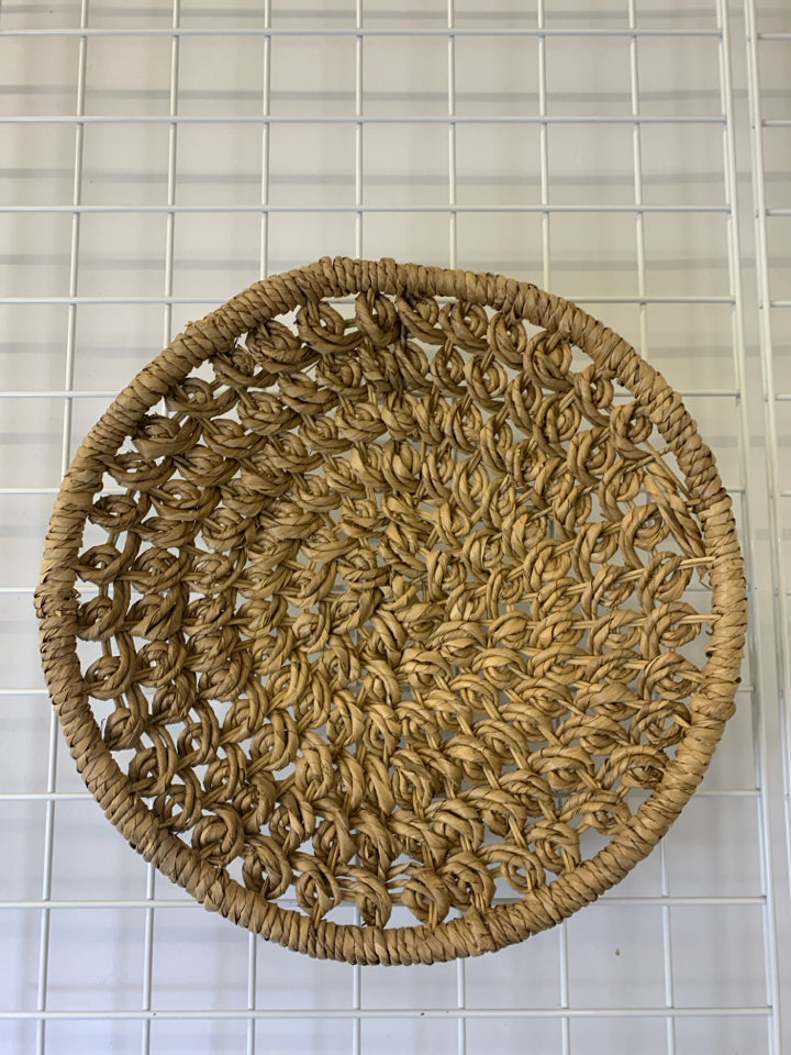 WOVEN CIRCLE BASKET WALL ART.