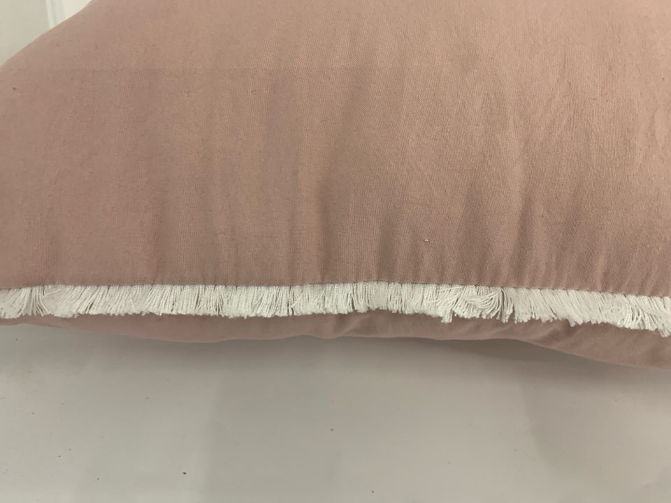 PALE PINK PILLOW W WHITE TASSELS.