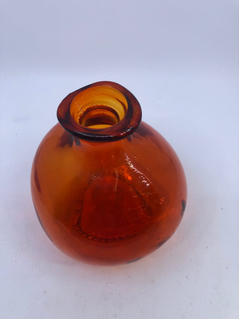 ROUND ORANGE GLASS VASE.