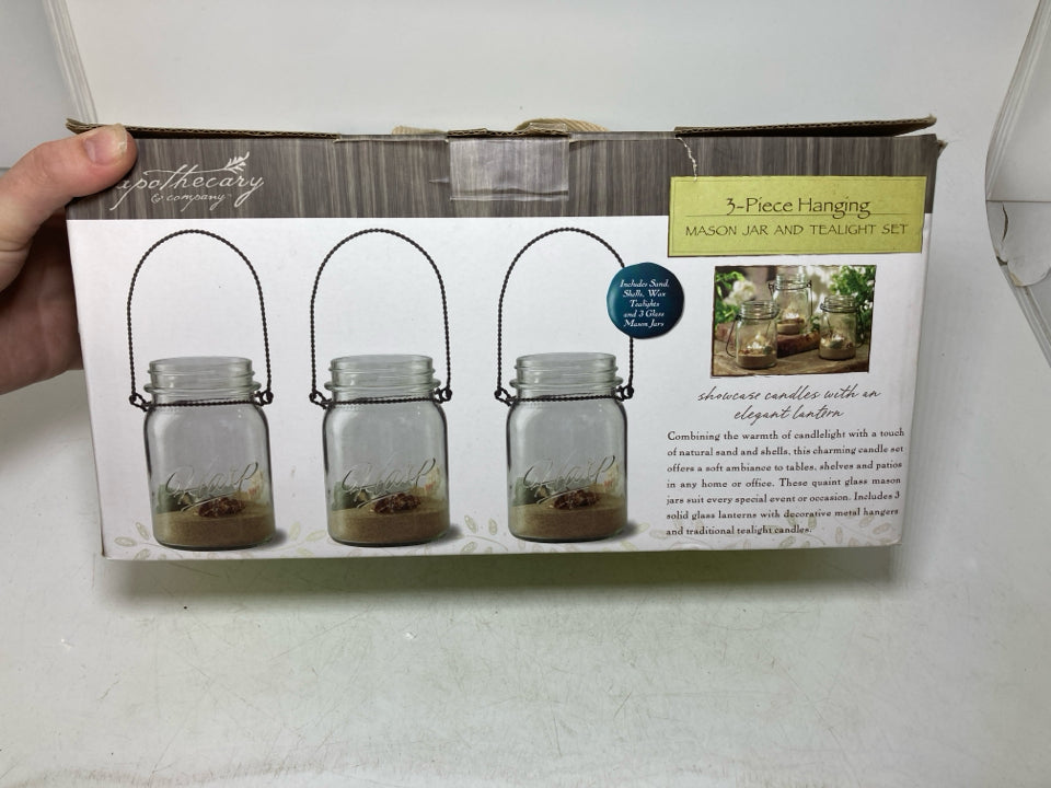 NIB 3 PC HANGING TEA LIGHT MASON JAR SET W/ SAND SHELLS.