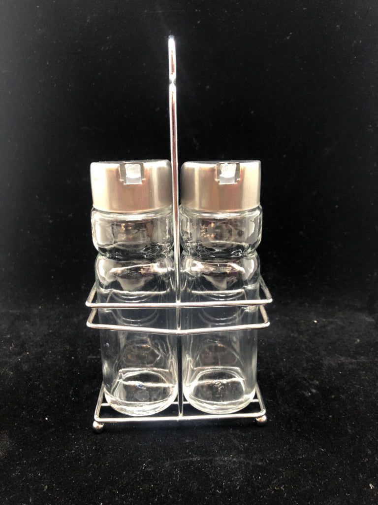 GLASS OIL/VINEGAR DISPENSERS IN METAL HOLDER.