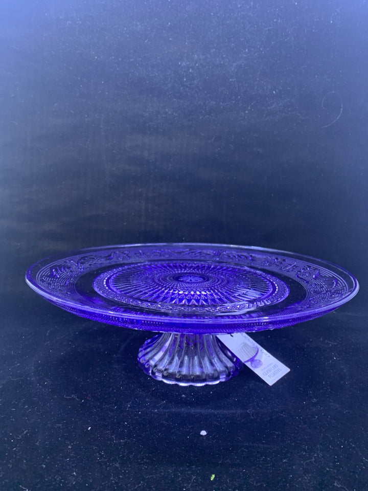 NEW TINTED PURPLE GLASS FOOTED CAKE DISH.