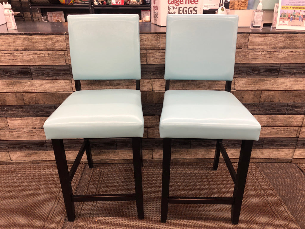 2 AQUA FAUX LEATHER BAR STOOLS W/ BLACK LEGS.