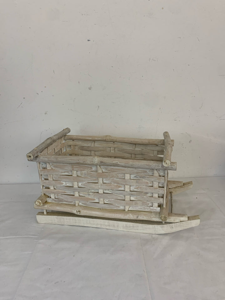 WHITE DISTRESSED WOOD SLED DECOR.