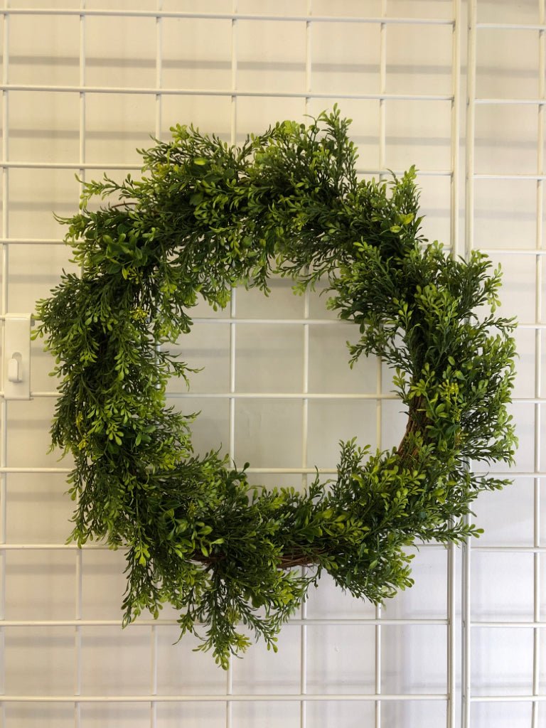 TWIG W GREENS WREATH.