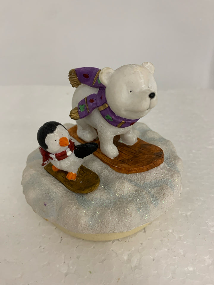 POLAR BEAR/PENGUIN ON SLEDS CANDLE TOPPER.