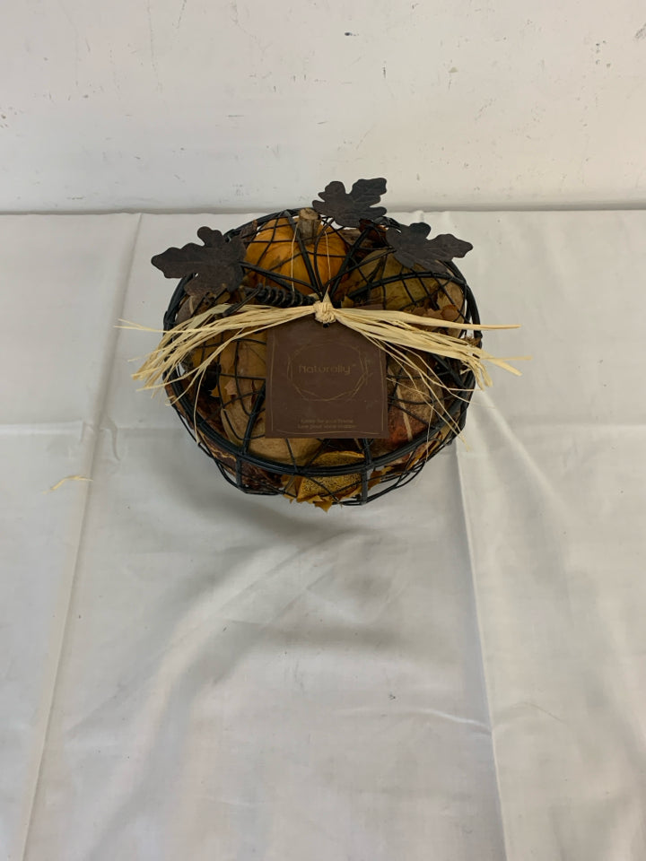 FALL POTPOURRI IN METAL PUMPKIN BASKET.