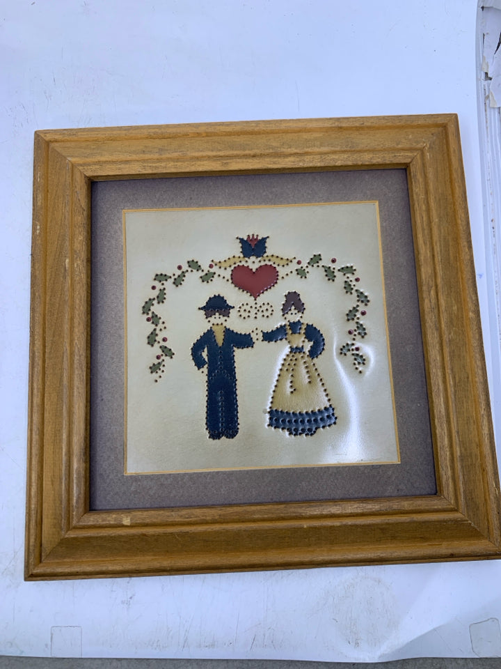 METAL PUNCHED AMISH COUPLE WALL ART.