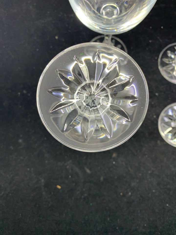 4 MEDIUM SIZED HEAVY CRYSTAL WINE GLASSES.