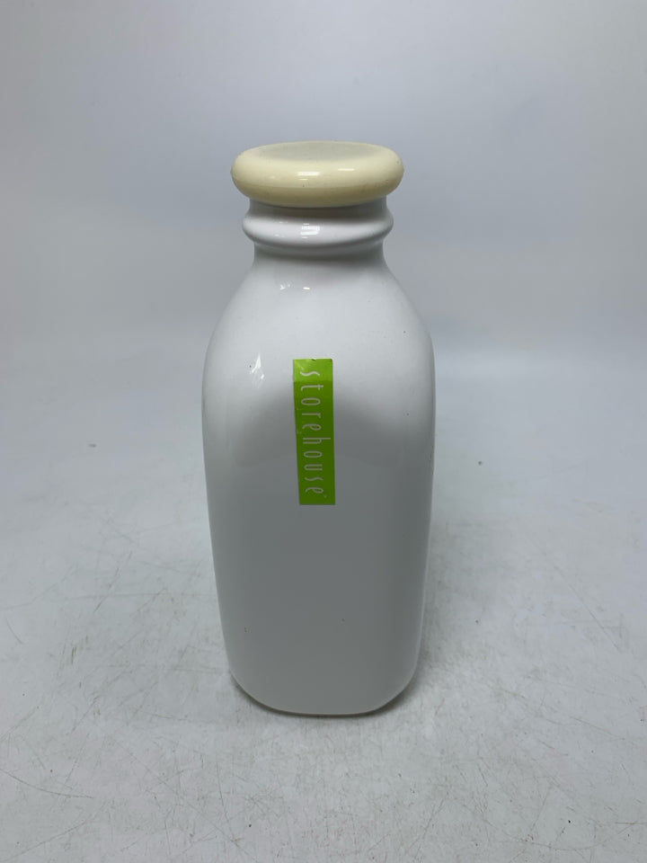 WHITE CERAMIC MILK BOTTLE W/ CAP.