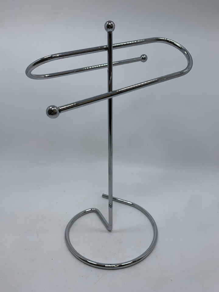SILVER METAL TOWEL HOLDER.