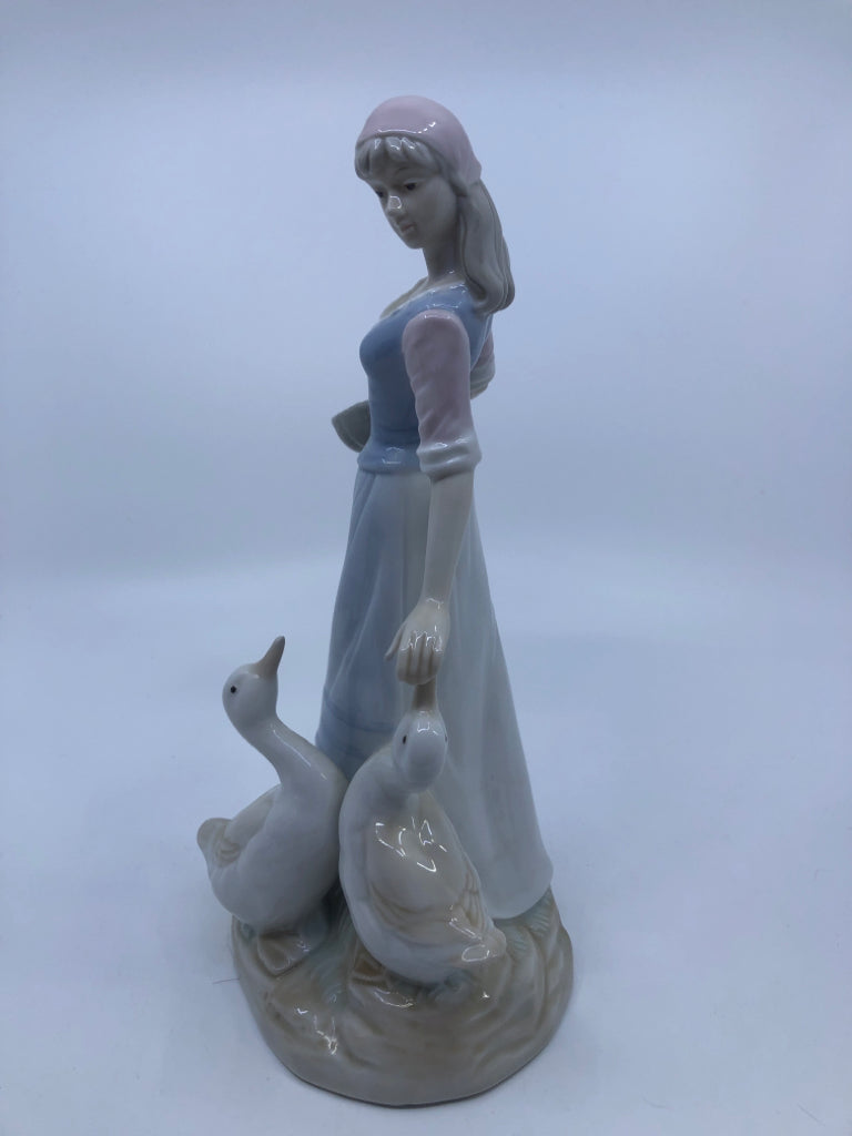 GIRL FEEDING GEESE PORCELAIN FIGURINE.