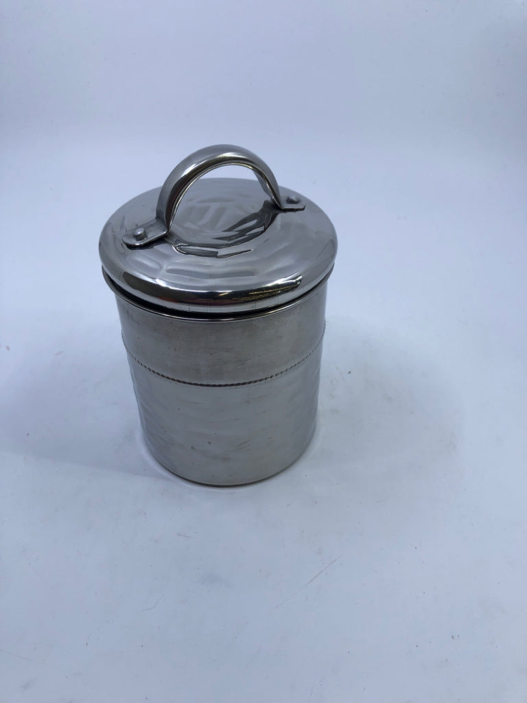 METAL DIMPLED CANISTER.