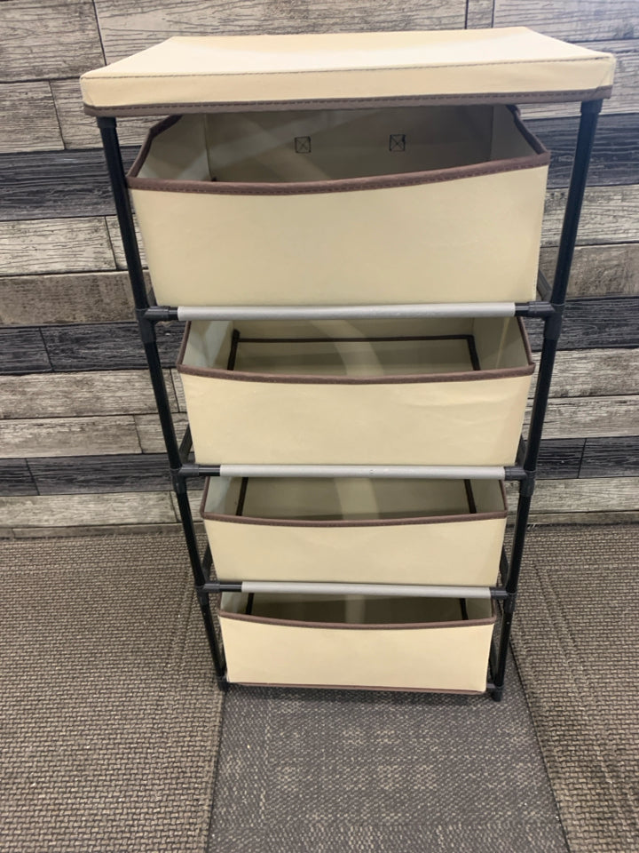 4 CUBE TAN FABRIC STORAGE W/BLACK PLASTIC FRAME.