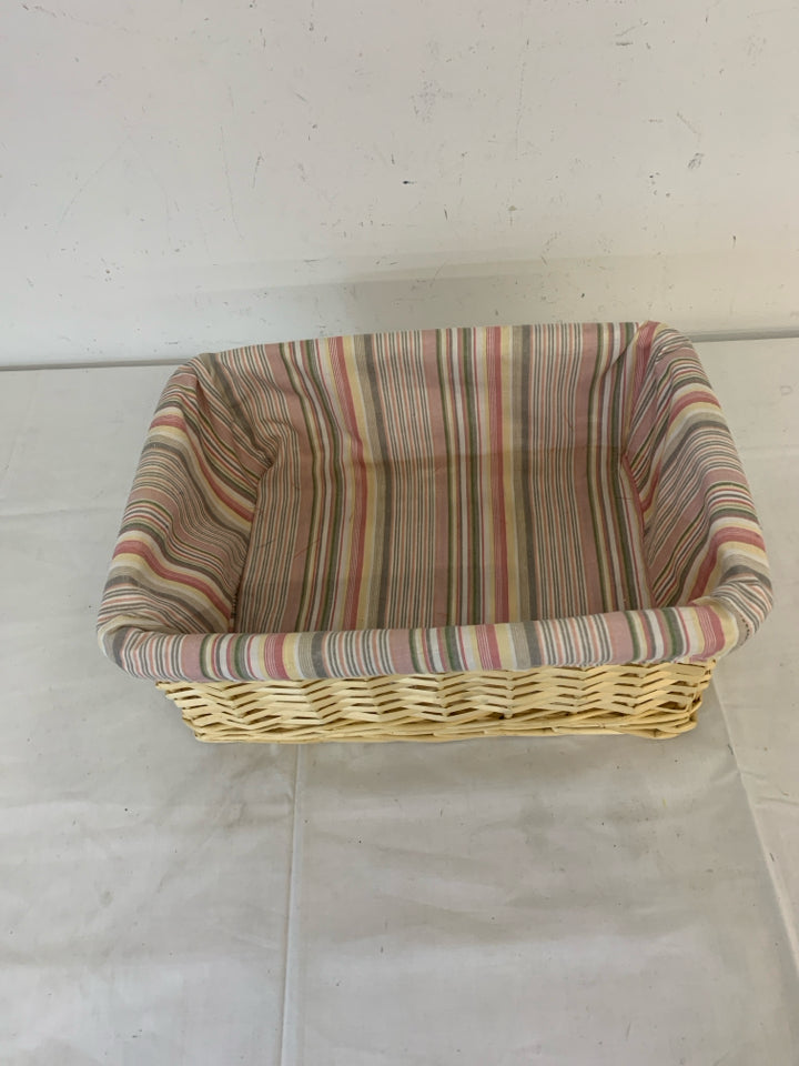 BLONDE WOVEN BASKET W PINK STRIPED LINER.