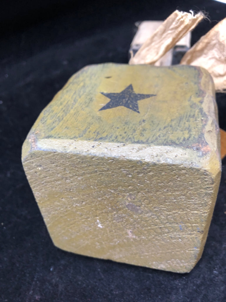 PRIMITIVE SHEEP ON GREEN BLOCK BLACK STAR.