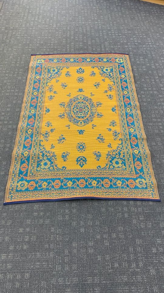 BLUE/ORANGE MAD MATS REVERSIBLE INDOOR OUTDOOR RUG.