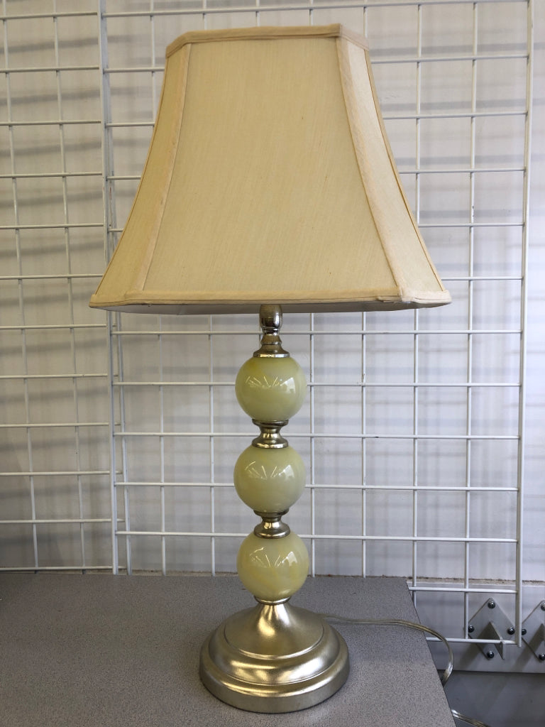 YELLOW GLASS STACKING BALL BASE LAMP W TAN SHADE.